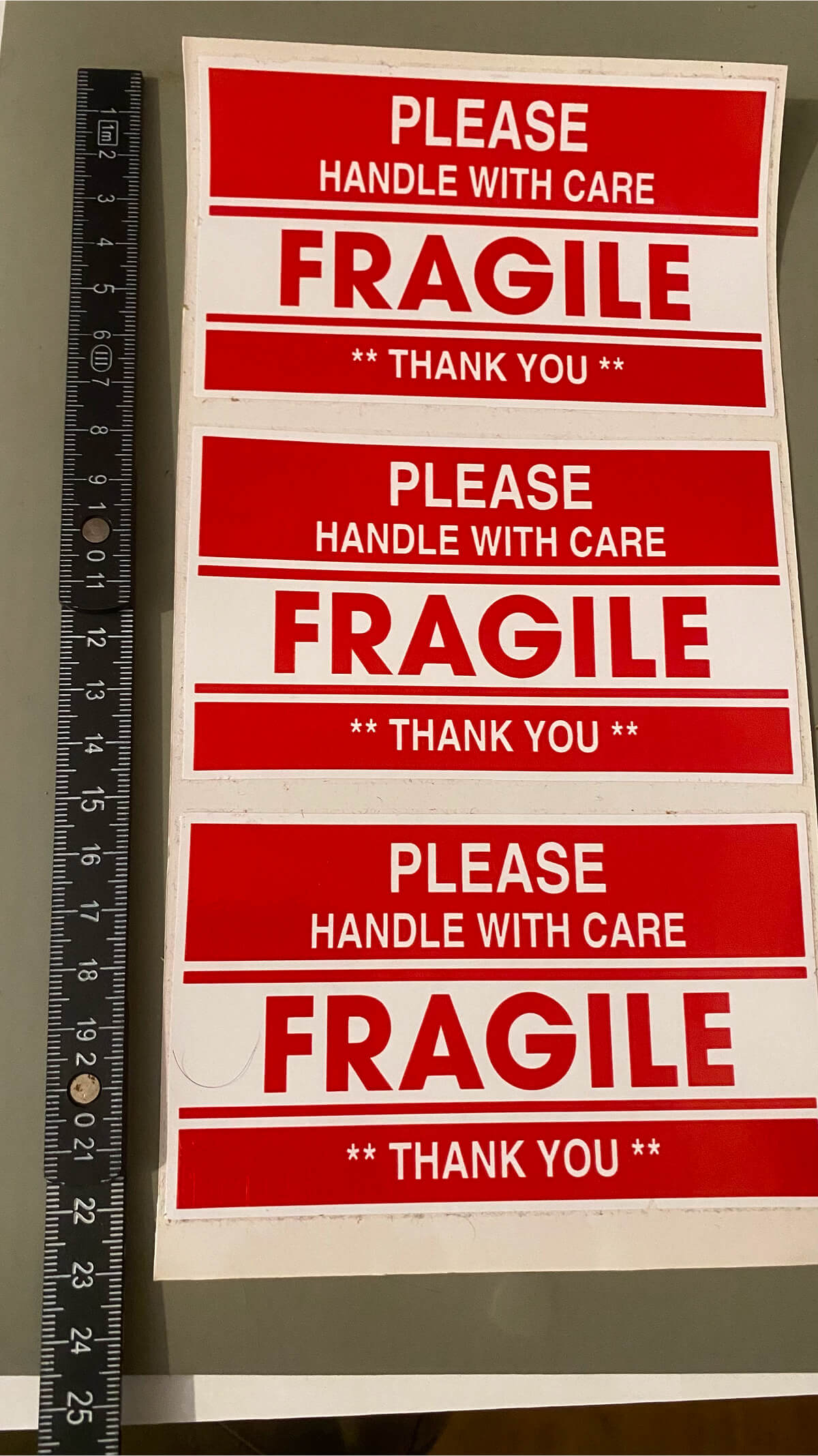 Fragile sticker x 4   = 11.7 cms x 7 cms